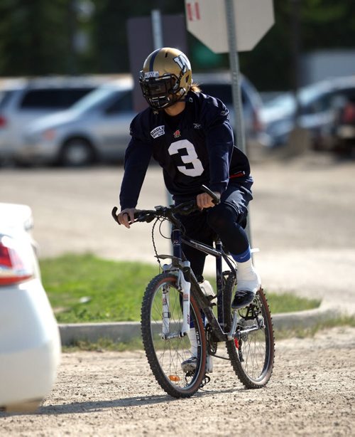 WINNIPEG BLUE BOMBER PRACTICE - Cycling to work #3 Graig Newman. BORIS MINKEVICH/WINNIPEG FREE PRESS June 17, 2015
