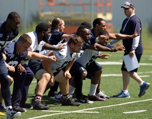 WINNIPEG BLUE BOMBERS WALK THROUGH PRACTICE - Linesmen go through some drills.  BORIS MINKEVICH/WINNIPEG FREE PRESS June 18, 2015