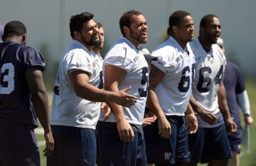 WINNIPEG BLUE BOMBERS WALK THROUGH PRACTICE - Linesmen go through some drills.  BORIS MINKEVICH/WINNIPEG FREE PRESS June 18, 2015