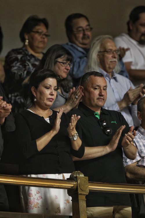 Coleen Rajotte (front row left), adoptee, '60s Scoop survivor applauds after Premier Greg Selinger offered an apology from the people of Manitoba during question period in the Manitoba Legislative Building Thursday.  150618 June 18, 2015 MIKE DEAL / WINNIPEG FREE PRESS