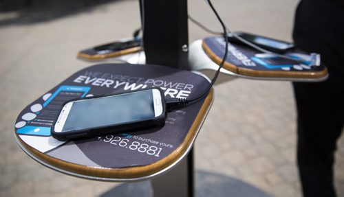 Phone charge at a mobile solar cell phone charging station installation in Winnipeg on Thursday, June 18, 2015.  This station at the Forks is the first of its kind in Canada. Mikaela MacKenzie / Winnipeg Free Press