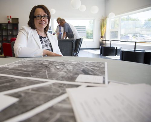 Michelle E. Richard, master of city planning for Richard Wintrup & Associates, at an open house for redevelopment plans for the snow dump, in Winnipeg on Thursday, June 18, 2015.  Mikaela MacKenzie / Winnipeg Free Press