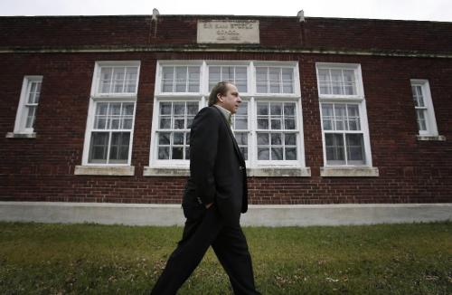 John Woods / Winnipeg Free Press / November 16/07- 071116  - Winnipeg realtor Garry Hirsch outside Sir Sam Steele School on Chester Street talked to the poses for a picture Friday November 16/07.   Hirsch says it is hard to sell old school properties.