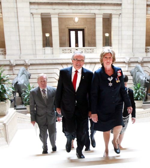 Lt Governor Janice Filmon and her husband Gary ascend the Grand Staircase towards the Legislative Chamber for her swearing in ceremony Friday. See story. June 19, 2015 - (Phil Hossack / Winnipeg Free Press)