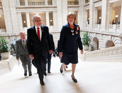 Gary and Janice Filmon ascend the Grand Staircase at the Mb Legislature en-route to Janice' swearing in as Lt Governonr Friday. June 19, 2015 - (Phil Hossack / Winnipeg Free Press)