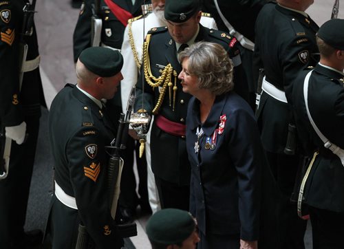 The honourable Janice Filmon, newly appointed as the Lieutenant-Governor of Manitoba, inspects the guards at the Manitoba Legislature Building during ceremony Friday.      June 19, 2015 Ruth Bonneville / Winnipeg Free Press