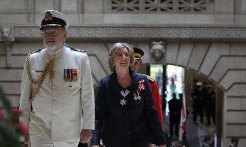 The honourable Janice Filmon, newly appointed as the Lieutenant-Governor of Manitoba, beams with a glowing smile as she makes her way up the grand staircase of the Manitoba Legislature Building after inspecting the guards during ceremony Friday.      June 19, 2015 Ruth Bonneville / Winnipeg Free Press