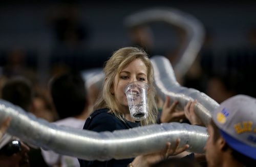 "FEED THE SNAKE!" The Beer Snake returns as the Winnipeg Blue Bombers' play against the Hamilton Tiger-Cats' during preseason CFL action, Friday, June 19, 2015. (TREVOR HAGAN/WINNIPEG FREE PRESS)