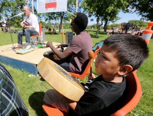 Nathan Rogers, Matthew Ndaya and Alvin Deegan Jr. all playing together at the Bread and Bannock Festival near the Community Oven at Norquay Community Centre, Saturday, June 20, 2015. (TREVOR HAGAN/WINNIPEG FREE PRESS)