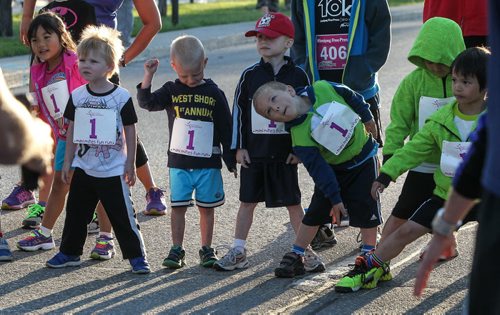 Participants in the Mini Mites run at the Manitoba Marathon outside the IGF Stadium on Chancellor Matheson Road Sunday morning. 150621 - Sunday, June 21, 2015 -  MIKE DEAL / WINNIPEG FREE PRESS