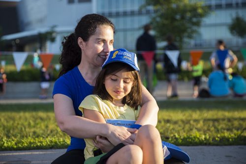 Celia Trozzo and her daughter, Chiara, wait for their start wave before running the 2.6 mile super run at the Manitoba Marathon in Winnipeg on Sunday, June 21, 2015.  Mikaela MacKenzie / Winnipeg Free Press