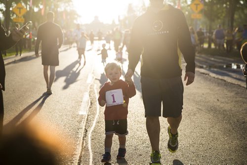 A little runner participates in the kid's race at the Manitoba Marathon in Winnipeg on Sunday, June 21, 2015.  Mikaela MacKenzie / Winnipeg Free Press