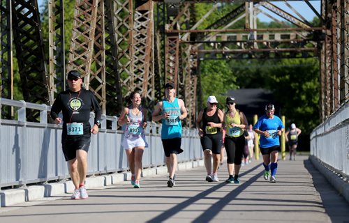 Participants in the Manitoba Marathon on the BDI Bridge, Sunday, June 21, 2015. (TREVOR HAGAN/WINNIPEG FREE PRESS)