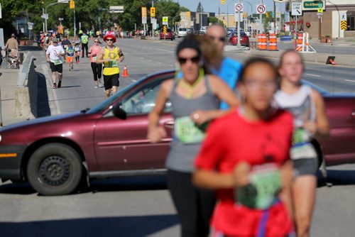 On Portage Avenue crossing over Route 90, participants in the Manitoba Marathon, Sunday, June 21, 2015. (TREVOR HAGAN/WINNIPEG FREE PRESS)