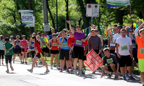 Relay checkpoint in Wolseley at Ruby Street. Participants in the Manitoba Marathon, Sunday, June 21, 2015. (TREVOR HAGAN/WINNIPEG FREE PRESS)