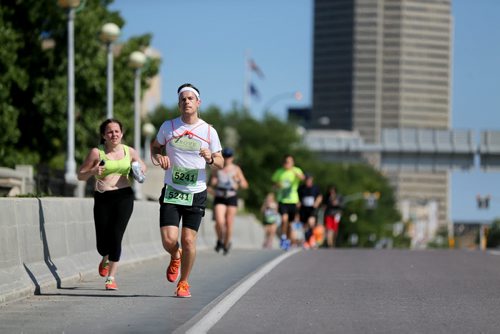 Runners on Main Street. Participants in the Manitoba Marathon, Sunday, June 21, 2015. (TREVOR HAGAN/WINNIPEG FREE PRESS)