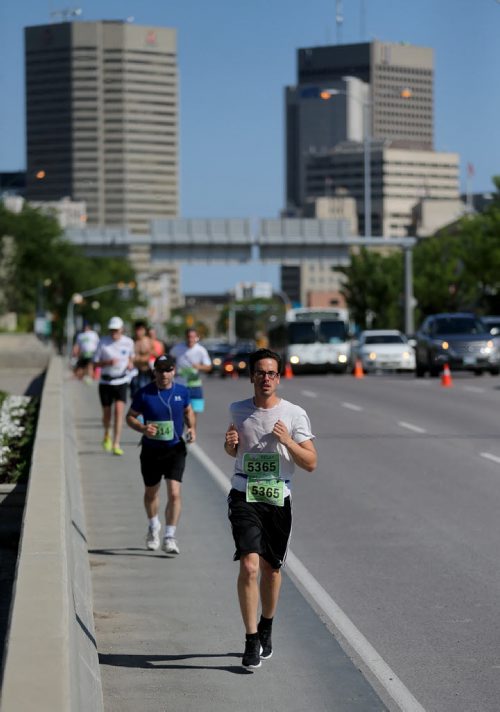 Participants in the Manitoba Marathon, Sunday, June 21, 2015. (TREVOR HAGAN/WINNIPEG FREE PRESS)