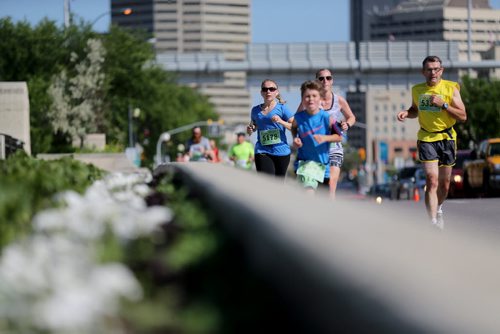 Runners on Main Street. Participants in the Manitoba Marathon, Sunday, June 21, 2015. (TREVOR HAGAN/WINNIPEG FREE PRESS)