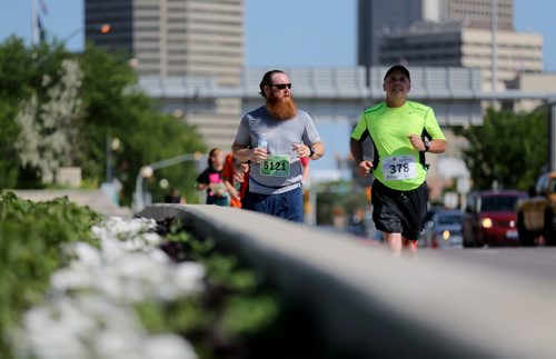 Runners on Main Street. Participants in the Manitoba Marathon, Sunday, June 21, 2015. (TREVOR HAGAN/WINNIPEG FREE PRESS)