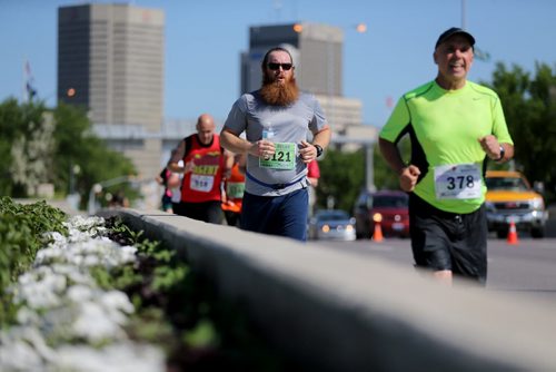 Runners on Main Street. Participants in the Manitoba Marathon, Sunday, June 21, 2015. (TREVOR HAGAN/WINNIPEG FREE PRESS)