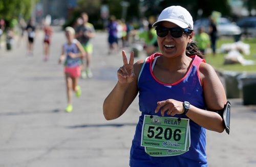 A runner on Lyndale Drive. Participants in the Manitoba Marathon, Sunday, June 21, 2015. (TREVOR HAGAN/WINNIPEG FREE PRESS)