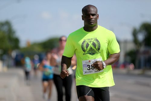 On St.Mary's road. Participants in the Manitoba Marathon, Sunday, June 21, 2015. (TREVOR HAGAN/WINNIPEG FREE PRESS)