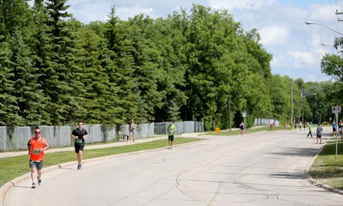 Runners on River Road. Participants in the Manitoba Marathon, Sunday, June 21, 2015. (TREVOR HAGAN/WINNIPEG FREE PRESS)