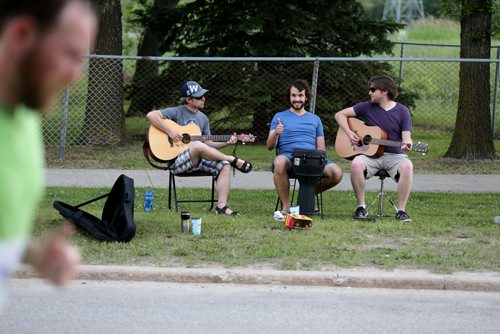 Mike McDermid, Alex Kozub and Jared Adams, Colour by Numbers, performing for participants in the Manitoba Marathon along River Road, Sunday, June 21, 2015. (TREVOR HAGAN/WINNIPEG FREE PRESS)