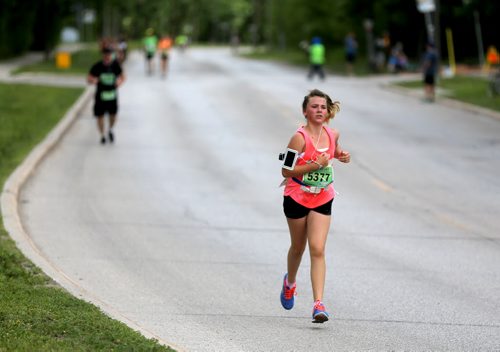 Runners on River Road. Participants in the Manitoba Marathon, Sunday, June 21, 2015. (TREVOR HAGAN/WINNIPEG FREE PRESS)
