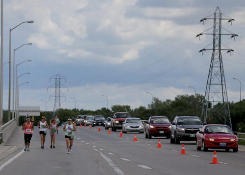 Fort Garry Bridge on Bishop Grandin. Participants in the Manitoba Marathon, Sunday, June 21, 2015. (TREVOR HAGAN/WINNIPEG FREE PRESS)