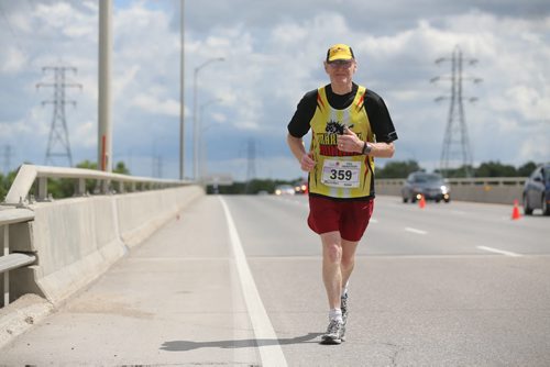 Fort Garry Bridge on Bishop Grandin. Participants in the Manitoba Marathon, Sunday, June 21, 2015. (TREVOR HAGAN/WINNIPEG FREE PRESS)