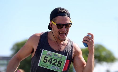 A runner on Lyndale Drive. Participants in the Manitoba Marathon, Sunday, June 21, 2015. (TREVOR HAGAN/WINNIPEG FREE PRESS)