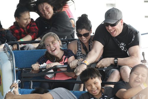 June 21, 2015 - 150621  -  Kylie, Melanie and Reid Sly go enjoy Father's Day at the Red River Ex in Winnipeg Sunday, June 21, 2015. John Woods / Winnipeg Free Press