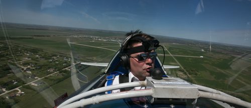 Pilot Luke Penner. Harv's Air Pilot Training offers rides in the Pitts S2B aerobatic biplane for $250 a demonstration ride. The trip can include loops, rolls, hammerheads, barrel rolls and vertical rolls among other aerobatic maneuvers.  June 04, 2015 - MELISSA TAIT / WINNIPEG FREE PRESS
