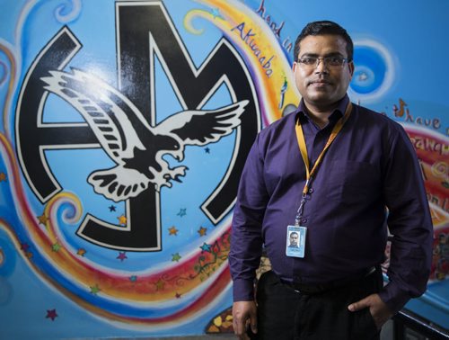 Chandra Gautam, cross-cultural support worker, helps new immigrants settle into life in Canada at Hugh John McDonald School.  Gautam himself moved from Nepal about five years ago, and understands the difficulties that many have in their first months in a new country. Mikaela MacKenzie / Winnipeg Free Press