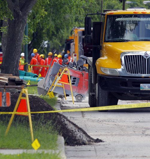 Major gas leak when a cement cutter hit a 12in gas line just south of Eugenie and Des Meurons. in misddle of photo is the saw that cut the pipe. BORIS MINKEVICH/WINNIPEG FREE PRESS June 23, 2015