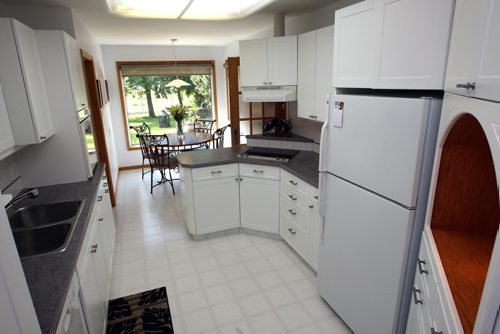 78 St. Michaels Road in St. Vital. Realtor Lynda Mackie. Kitchen. BORIS MINKEVICH/WINNIPEG FREE PRESS June 23, 2015