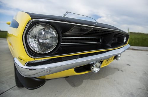 Rhonda Reyher shows off her 1970 AAR 'Cuda, which she believes to be one of the only ones in Manitoba, in Winnipeg on Tuesday, June 23, 2015. Mikaela MacKenzie / Winnipeg Free Press