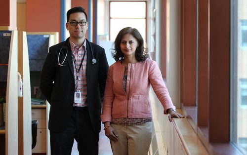 Dr. Sandhya Pruthi with the Mayo Clinic (woman) and Julian Kim from Cancercare with new program for the iPad for newly-diagnosed breast cancer patients to help them get through it.   See Carol Sanders story.   June 24,, 2015 Ruth Bonneville / Winnipeg Free Press