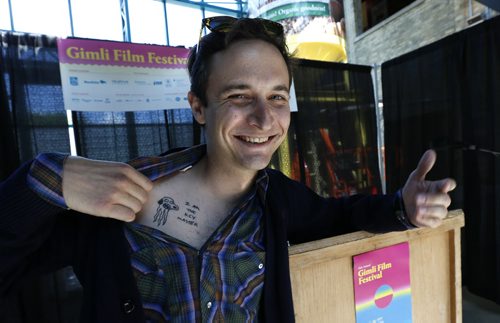 Aaron Zeghers, Film Programer of the 2015 Gimli Film Festival shows off  his tattoo illustration  by animator Don Hertzfeldt after a news conference at The Forks Thursday that announced this year's films including a Don Hertzfeldt Retrospective.  Randall King story  Wayne Glowacki / Winnipeg Free Press June 25  2015