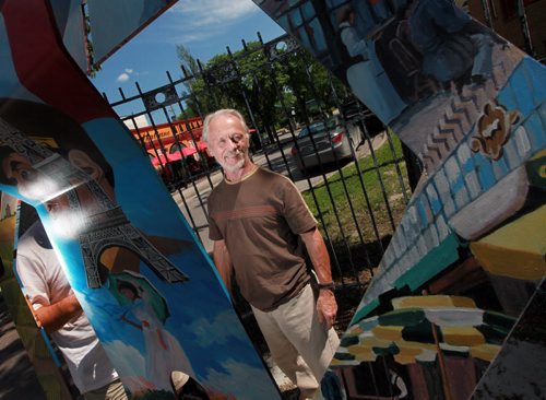 Hubert Theroux, the artist behind the street art piece about France framed in his piece. Corydon Avenue Biz has a new street art initiative called the Colours of Corydon which involves eight huge abstract metal figures that represent eight different countries. They will all be positioned at various spots on Corydon. See Kevin Prokosh story. June 25, 2015 - (Phil Hossack / Winnipeg Free Press)