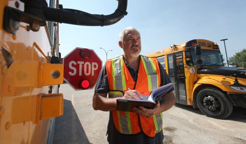 Maurice Gregoire, president and lead product designer at Teknisult set up a pilot project placing cameras on sides of school buses to catch drivers passing when stopping guard is out.   See Jessica Botelho-Urbanski story.  June 26,, 2015 Ruth Bonneville / Winnipeg Free Press
