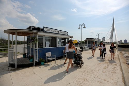 On the east side of the Esplanade Riel, three seasonal kiosks designed to look like horse-draw trams. The tourist arm of Enterprises Riel operates them, Sunday, June 28, 2015. (TREVOR HAGAN/WINNIPEG FREE PRESS) for murray mcneill