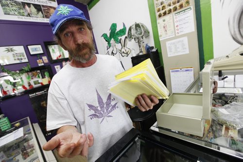 June 29, 2015 - 150629  -  Glenn Price shows some of the 200+ prescriptions he has received at his store in Winnipeg Monday, June 29, 2015. John Woods / Winnipeg Free Press