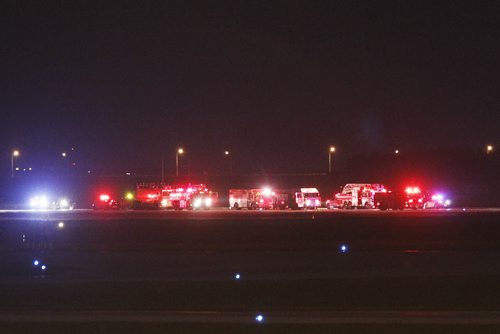 June 29, 2015 - 150629  -   Emergency crews were called to attend to a WestJet flight from Edmonton to Toronto which was diverted to Winnipeg due to a threat Monday, June 29, 2015.  John Woods / Winnipeg Free Press