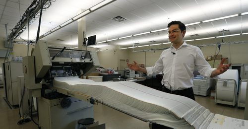 Pierre Poilievre, Minister of Employment and Social Development tours the print room Tuesday at the  Winnipeg Production Centre, where Universal Child Care Benefit cheques are printed for a portion of eligible families across Canada. The cheques will be mailed and received by families starting July 20th. About 1.2 million cheques will be printed, with production done at centres in Winnipeg and Quebec City. About 2.7million additional UCCB payments will be made via direct deposit, for a total of 3.85million payments. Mia Rabson story  Wayne Glowacki / Winnipeg Free Press June 30  2015