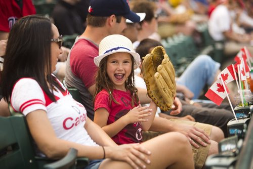 Rachel Brown, 5, watches the Winnipeg Goldeyes play the Sioux City Explorers on Canada Day at Shaw Park on Wednesday, July 1, 2015. Mikaela MacKenzie / Winnipeg Free Press