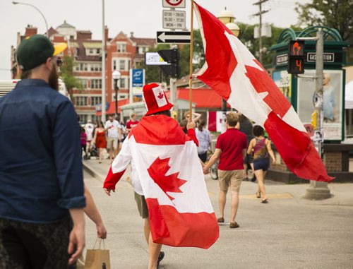 Winnipeggers celebrate Canada Day at the annual Osborne Street Festival on Wednesday, July 1, 2015. Mikaela MacKenzie / Winnipeg Free Press