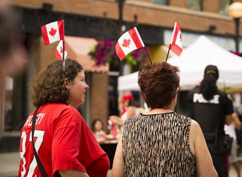 Winnipeggers celebrate Canada Day at the annual Osborne Street Festival on Wednesday, July 1, 2015. Mikaela MacKenzie / Winnipeg Free Press