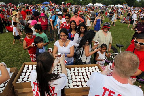 Canada Day party at the Assiniboine Park Lyric Theatre. Free cake for everyone. BORIS MINKEVICH/WINNIPEG FREE PRESS July 1, 2015